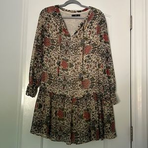A nice floral dress, from mango. US size 4. It isn’t to short but not to long.